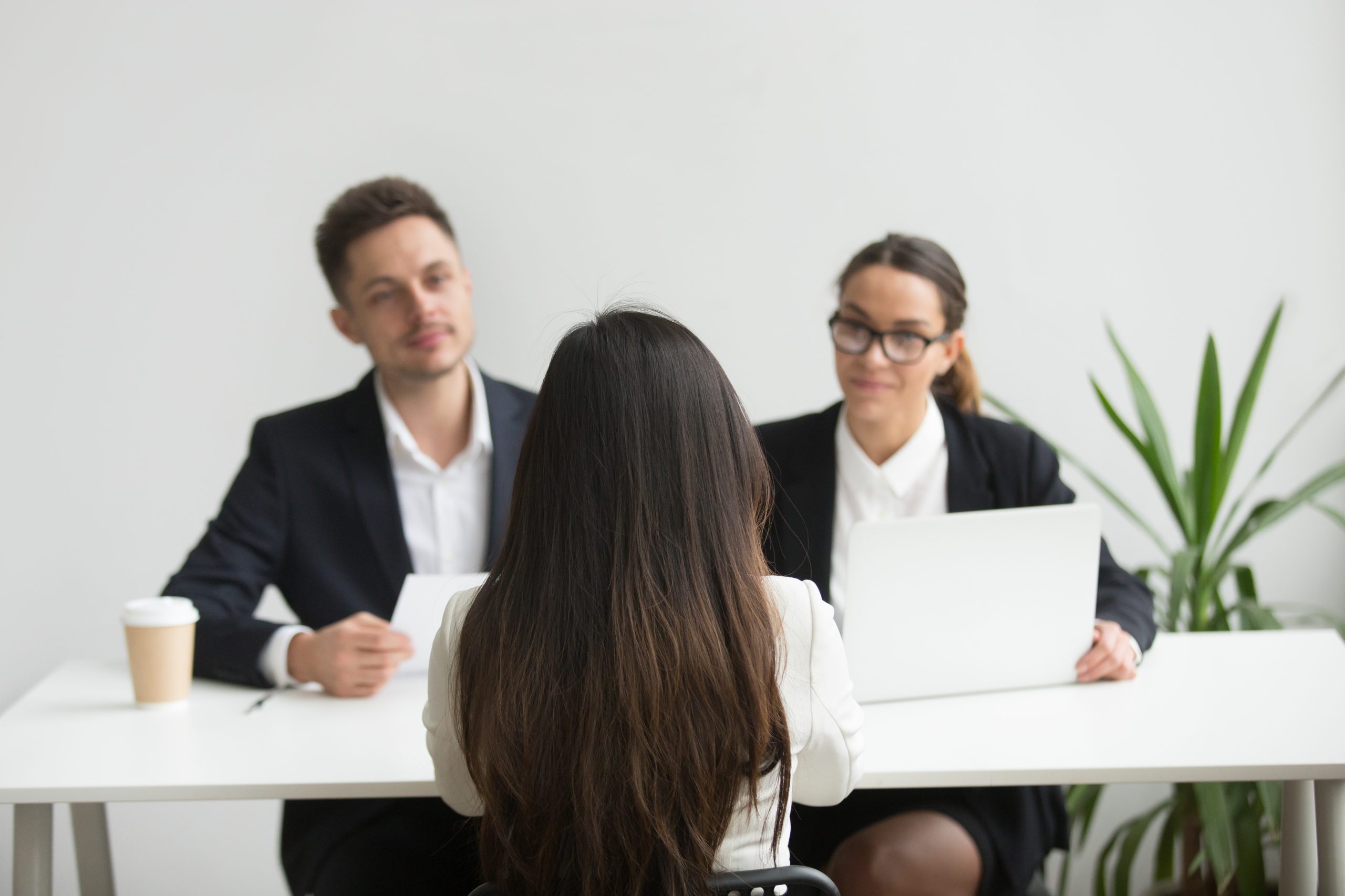 headhunters-interviewing-female-job-candidate-1.jpg