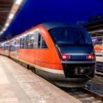 passenger-train-station-night-view-front-part-transport-tracks.jpg
